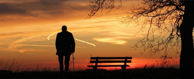 Silhouetted man watching sunset - Psalm 6