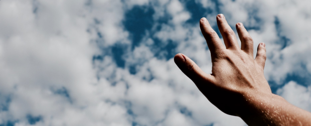 Hand reaching towards sky - Psalm 9