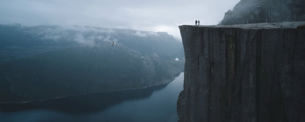People on top of a cliff