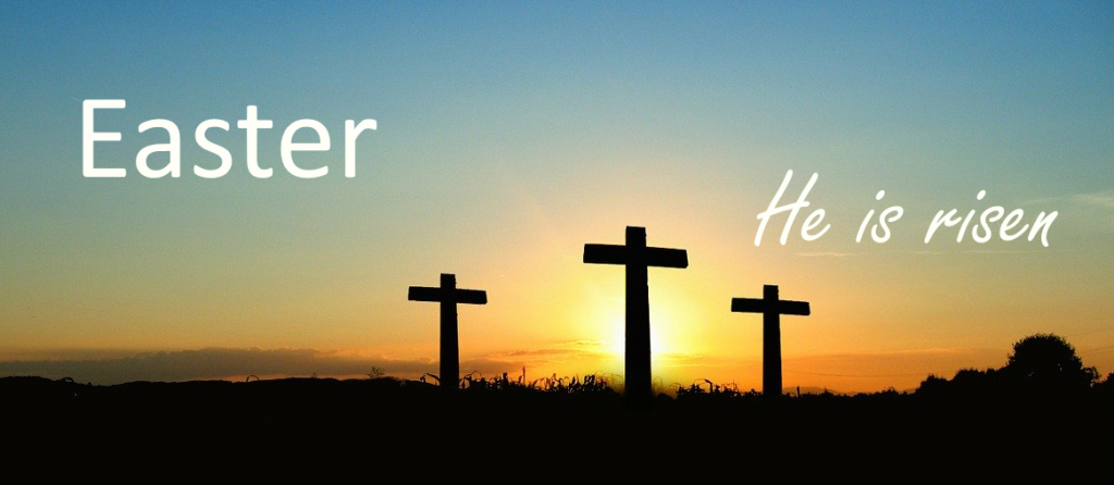 Three crosses silhouetted against the night sky